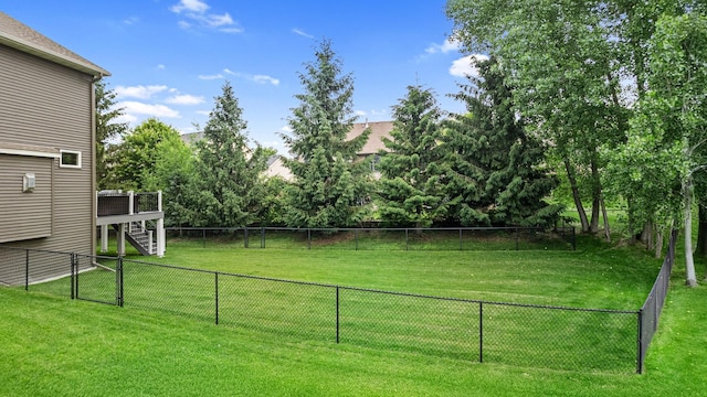 19550 Albany Cir NW, Elk River, MN 55330 - fenced backyard featuring stairs and a deck