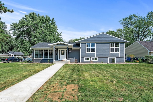 6901 Dawson Ln, Edina, MN 55435 - tri-level home featuring a front yard