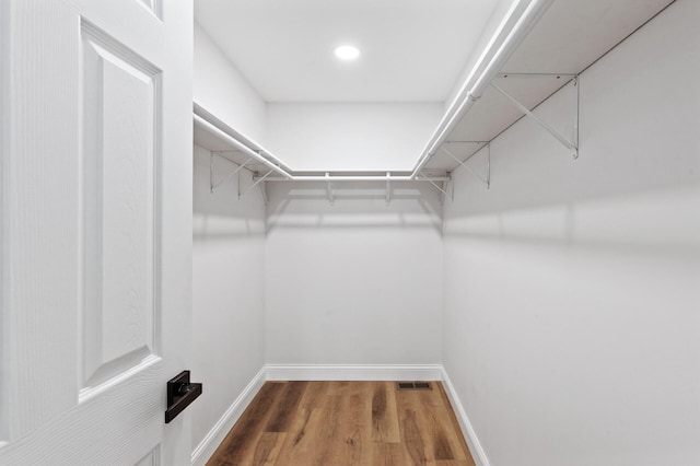 6901 Dawson Ln, Edina, MN 55435 - walk in closet with wood finished floors