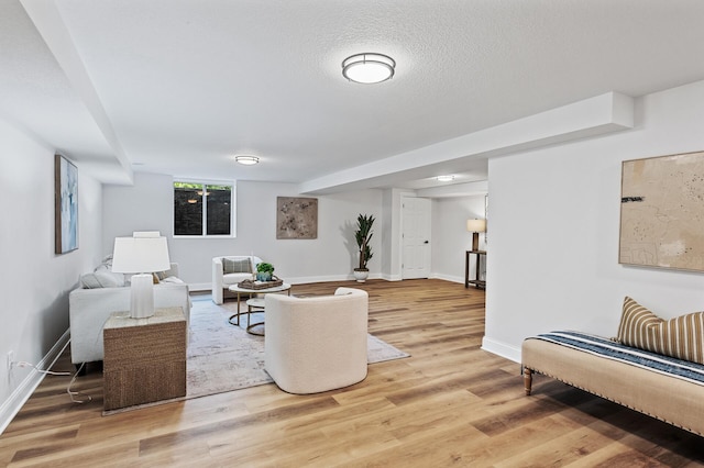 6901 Dawson Ln, Edina, MN 55435 - living area featuring light wood-type flooring and a textured ceiling