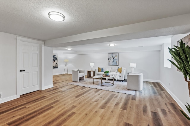 6901 Dawson Ln, Edina, MN 55435 - living room featuring wood finished floors and a textured ceiling