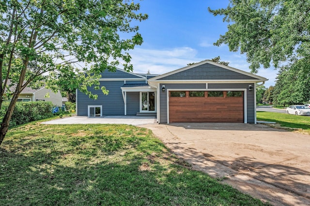 6901 Dawson Ln, Edina, MN 55435 - view of front of home featuring driveway, a garage, and a front yard