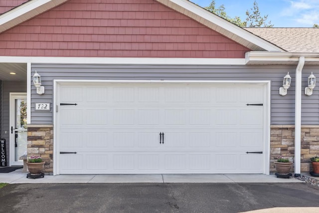 722 Hilltop Dr, Taylors Falls, MN 55084 - garage with driveway