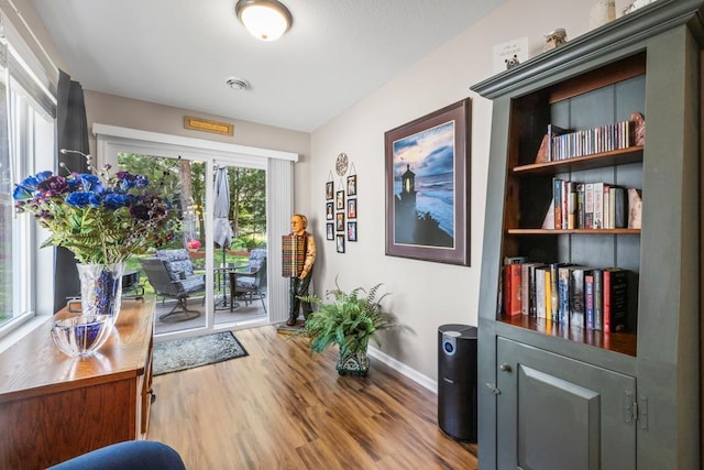 722 Hilltop Dr, Taylors Falls, MN 55084 - sitting room with baseboards and wood finished floors