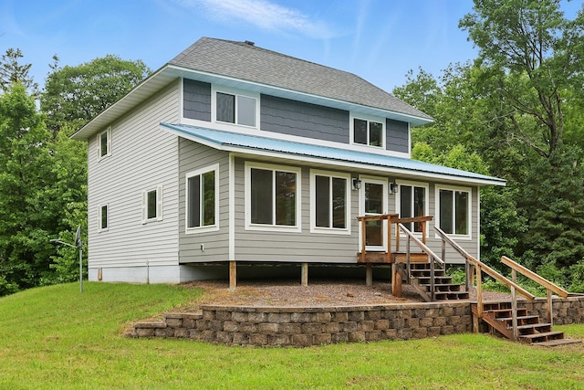 19316 Miller Rd, Dell Grove Twp, MN 55072 - view of front of home featuring a metal roof, stairs, a front yard, and roof with shingles