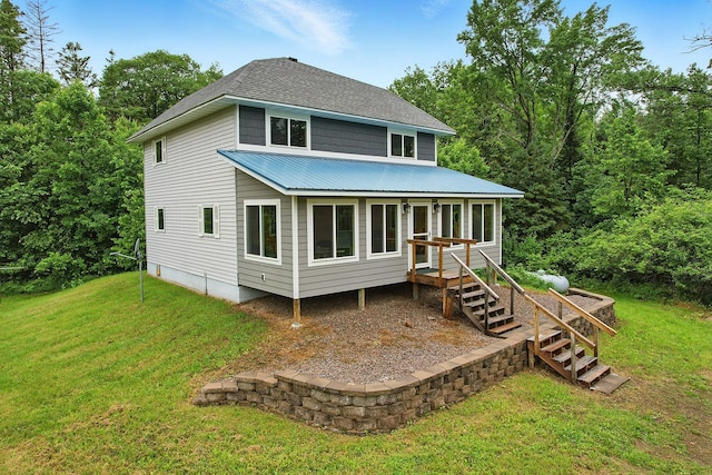 19316 Miller Rd, Dell Grove Twp, MN 55072 - rear view of property with a yard, stairway, and a metal roof