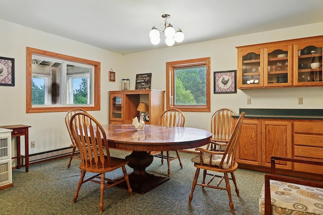 19316 Miller Rd, Dell Grove Twp, MN 55072 - dining area featuring a chandelier and baseboard heating