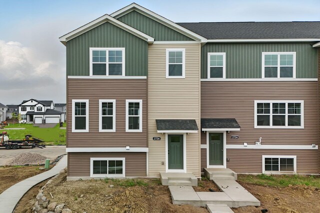 2726 Kepler Ave NE, Saint Michael, MN 55376 - view of front of house featuring a shingled roof and board and batten siding