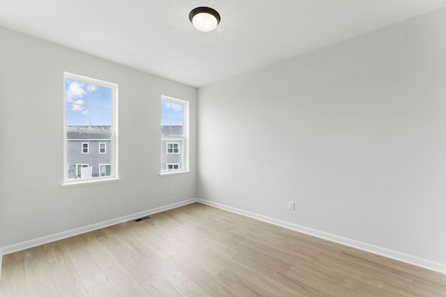 2726 Kepler Ave NE, Saint Michael, MN 55376 - unfurnished room featuring light wood-style floors and baseboards