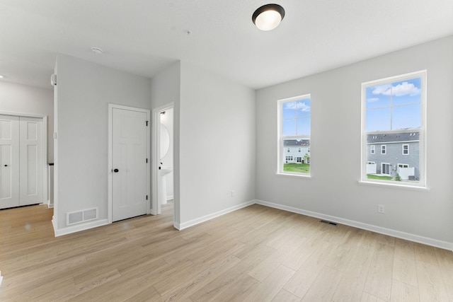 2726 Kepler Ave NE, Saint Michael, MN 55376 - unfurnished bedroom with light wood-type flooring and baseboards
