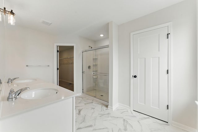 2726 Kepler Ave NE, Saint Michael, MN 55376 - full bathroom with a shower stall, marble finish floors, a spacious closet, double vanity, and recessed lighting