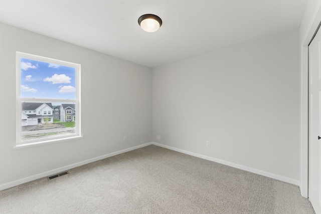 2726 Kepler Ave NE, Saint Michael, MN 55376 - carpeted empty room featuring baseboards