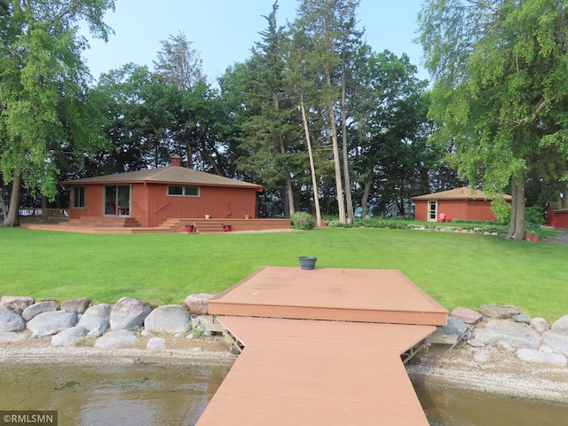 9429 Jeske Ave NW, Corinna Twp, MN 55302 - dock with a yard and a deck