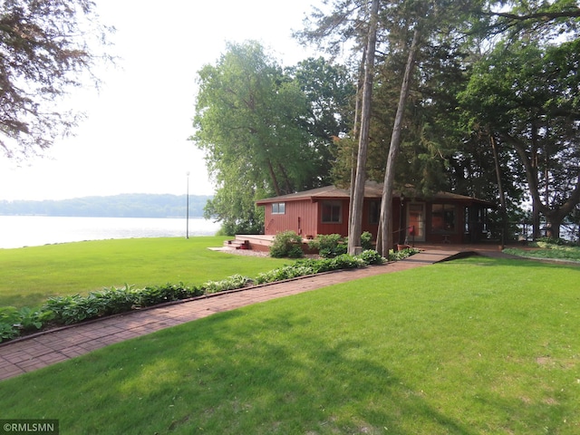9429 Jeske Ave NW, Corinna Twp, MN 55302 - view of grassy yard with a water view