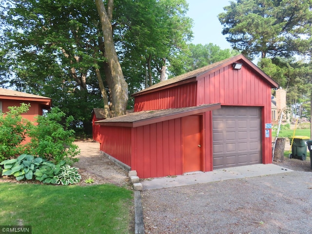 9429 Jeske Ave NW, Corinna Twp, MN 55302 - detached garage featuring asphalt driveway