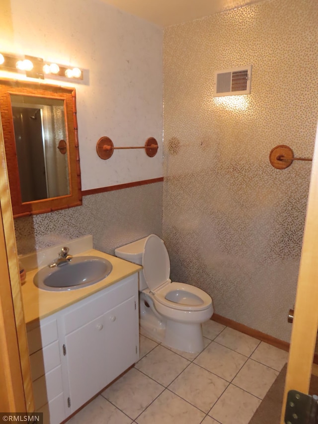 9429 Jeske Ave NW, Corinna Twp, MN 55302 - bathroom featuring vanity and tile patterned flooring