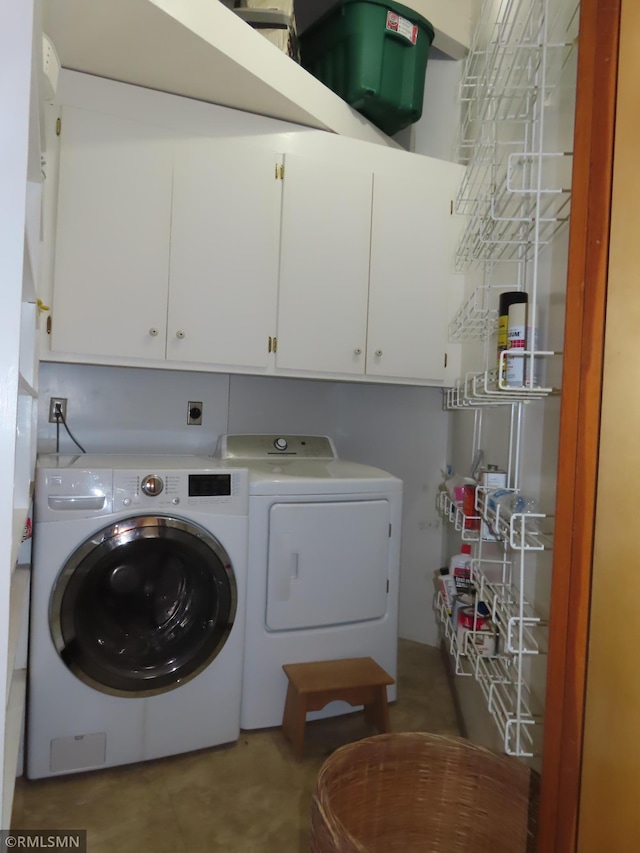 9429 Jeske Ave NW, Corinna Twp, MN 55302 - laundry room featuring washing machine and dryer and cabinet space