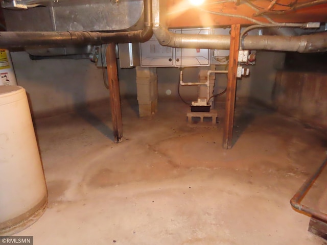 9429 Jeske Ave NW, Corinna Twp, MN 55302 - unfinished basement featuring water heater