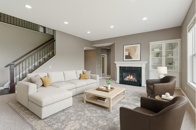 9721 Emerson Ct, Eden Prairie, MN 55347 - living room featuring a fireplace with flush hearth, recessed lighting, stairs, and carpet floors