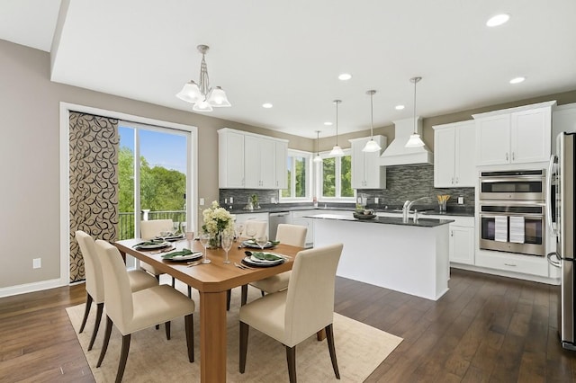 9721 Emerson Ct, Eden Prairie, MN 55347 - dining room with dark wood-type flooring, a chandelier, and recessed lighting