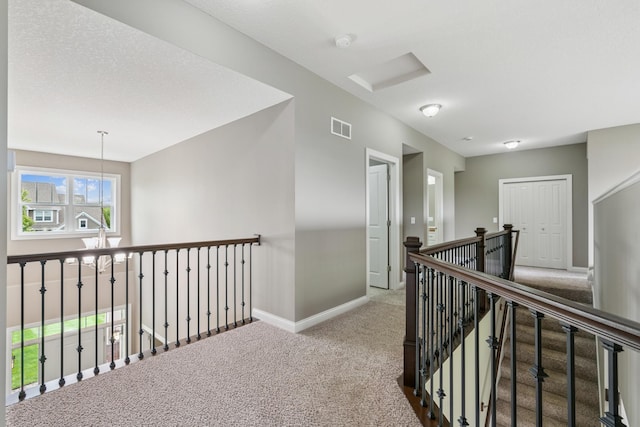 9721 Emerson Ct, Eden Prairie, MN 55347 - hallway featuring carpet floors and an upstairs landing