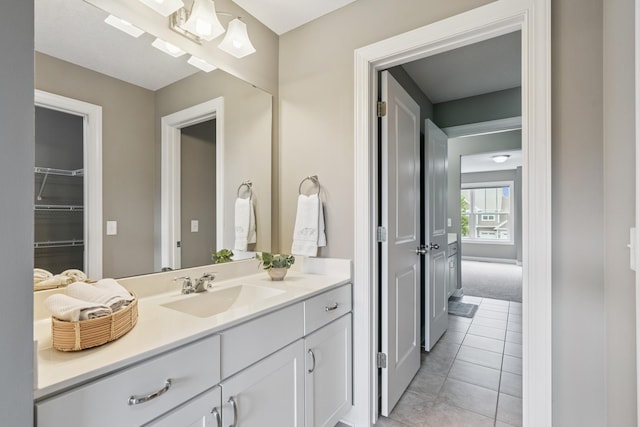 9721 Emerson Ct, Eden Prairie, MN 55347 - bathroom featuring vanity and tile patterned floors