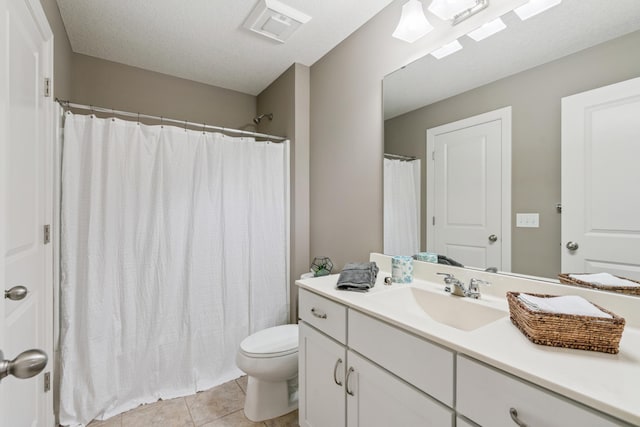 9721 Emerson Ct, Eden Prairie, MN 55347 - bathroom featuring vanity, tile patterned floors, and curtained shower