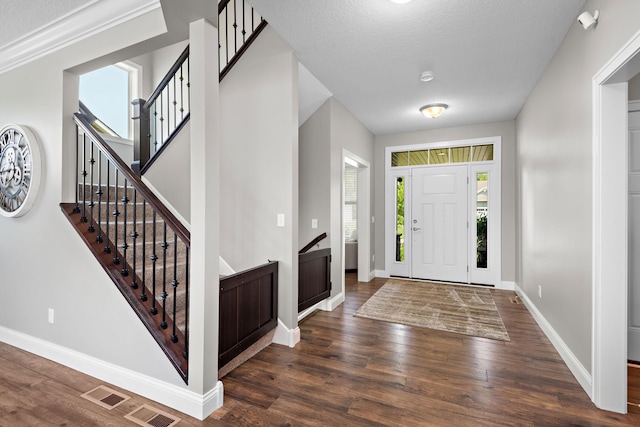 14675 77th St NE, Otsego, MN 55330 - foyer entrance featuring dark wood-style flooring and stairs