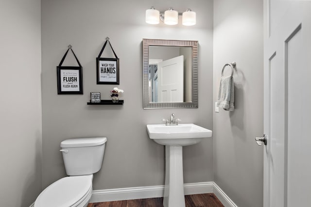 14675 77th St NE, Otsego, MN 55330 - bathroom featuring toilet and wood finished floors