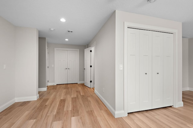 14675 77th St NE, Otsego, MN 55330 - corridor featuring light wood-type flooring and recessed lighting