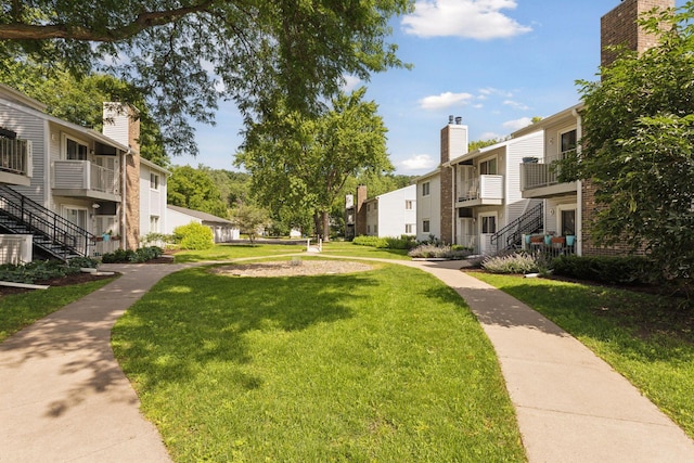 2254 Benson Ave Unit C, Saint Paul, MN 55116 - view of home's community featuring stairway, a residential view, and a lawn