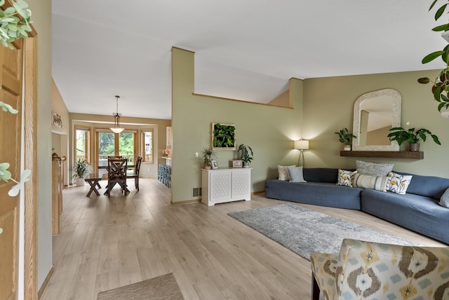5278 River Wood Dr, Savage, MN 55378 - living room with light wood finished floors and vaulted ceiling