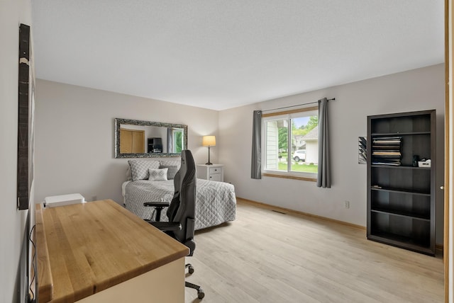 5278 River Wood Dr, Savage, MN 55378 - bedroom with light wood finished floors and baseboards