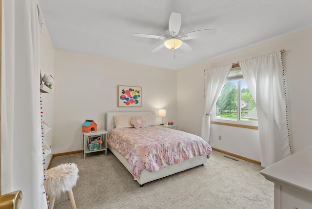 5278 River Wood Dr, Savage, MN 55378 - carpeted bedroom featuring baseboards and a ceiling fan