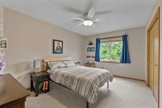 5278 River Wood Dr, Savage, MN 55378 - bedroom with light carpet, a closet, and ceiling fan