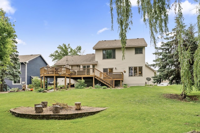 5278 River Wood Dr, Savage, MN 55378 - rear view of house with a wooden deck, an outdoor fire pit, a yard, and stairway