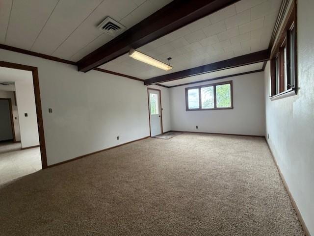 103 Circle Dr, Jackson, MN 56143 - spare room with light carpet, beamed ceiling, and crown molding