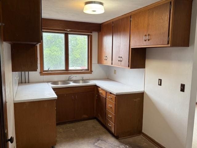 103 Circle Dr, Jackson, MN 56143 - kitchen featuring brown cabinets and light countertops