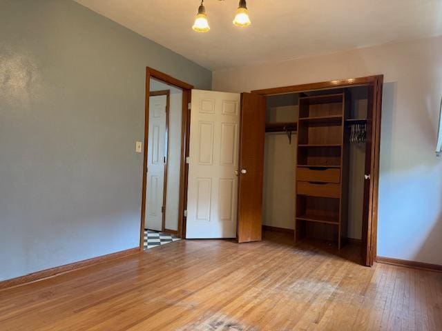 103 Circle Dr, Jackson, MN 56143 - unfurnished bedroom with light wood finished floors and a closet