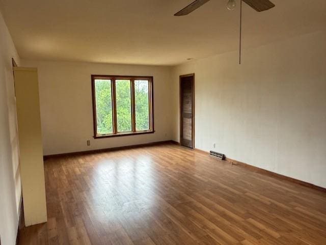 103 Circle Dr, Jackson, MN 56143 - empty room with wood finished floors and ceiling fan