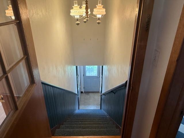 103 Circle Dr, Jackson, MN 56143 - stairway featuring a chandelier