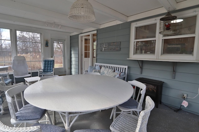 1138 Wintergreen Ln NE, Bemidji, MN 56601 - sunroom featuring outdoor dining space and beam ceiling