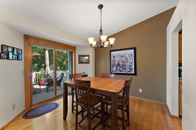 17317 Faraday Ct, Lakeville, MN 55024 - dining room with light wood finished floors and a chandelier