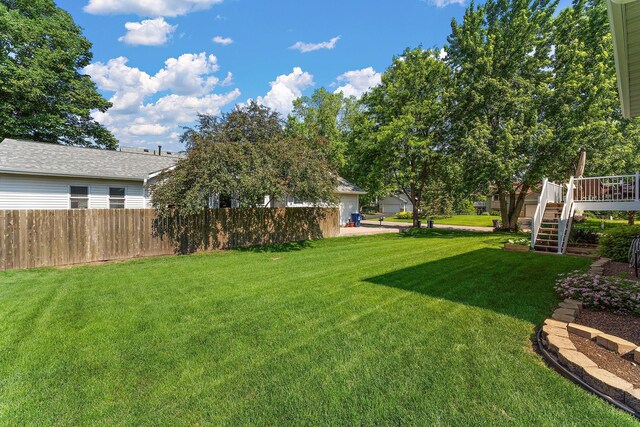 17317 Faraday Ct, Lakeville, MN 55024 - view of yard with stairway and a wooden deck