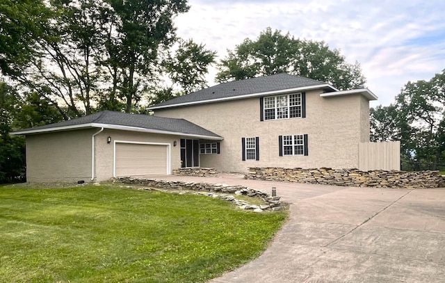30155 Lakeview Ave, Wacouta Twp, MN 55066 - view of front of home featuring an attached garage, stucco siding, and concrete driveway