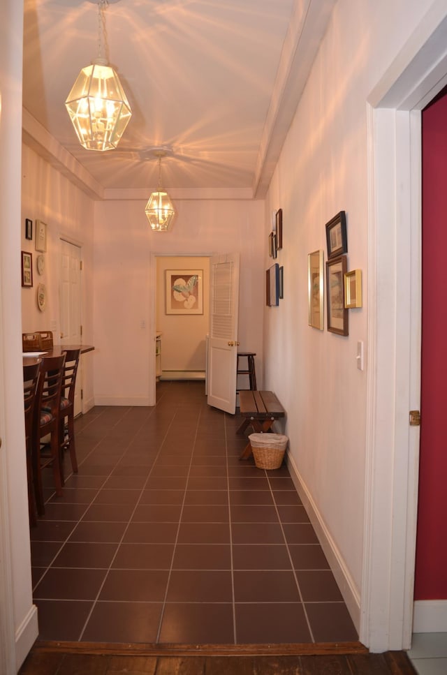 30155 Lakeview Ave, Wacouta Twp, MN 55066 - hallway featuring a chandelier, dark tile patterned floors, and crown molding