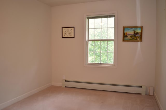 30155 Lakeview Ave, Wacouta Twp, MN 55066 - carpeted empty room with a baseboard heating unit and plenty of natural light