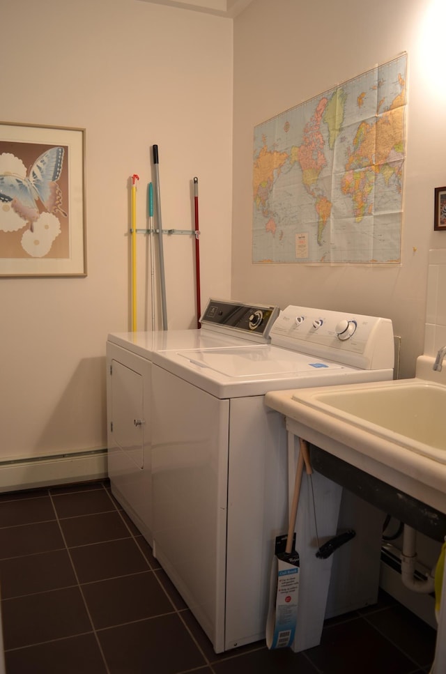 30155 Lakeview Ave, Wacouta Twp, MN 55066 - washroom featuring washing machine and dryer, a baseboard radiator, and dark tile patterned flooring