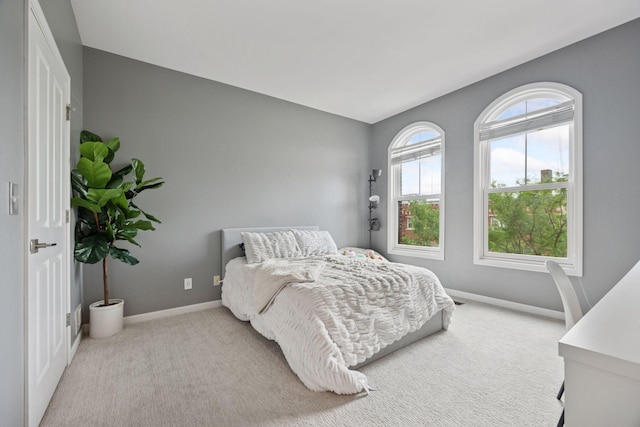 1020 Portland Ave, Minneapolis, MN 55404 - bedroom with carpet flooring and baseboards