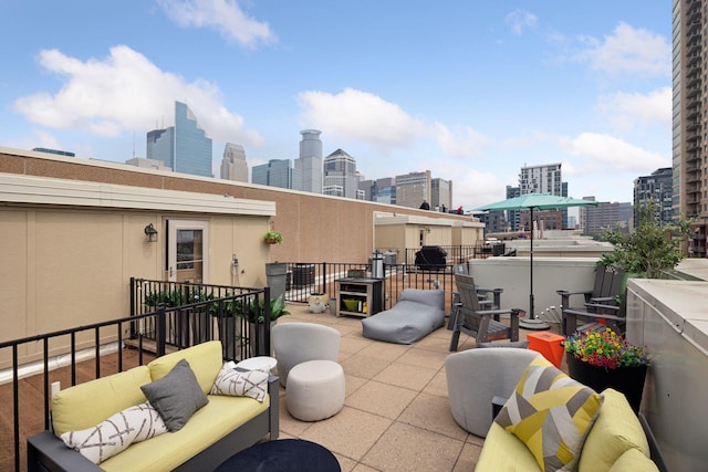 1020 Portland Ave, Minneapolis, MN 55404 - patio / terrace featuring a view of city and an outdoor living space
